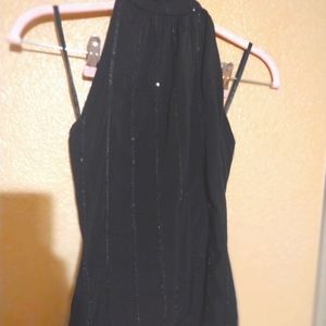 Sassy sleeveless black top